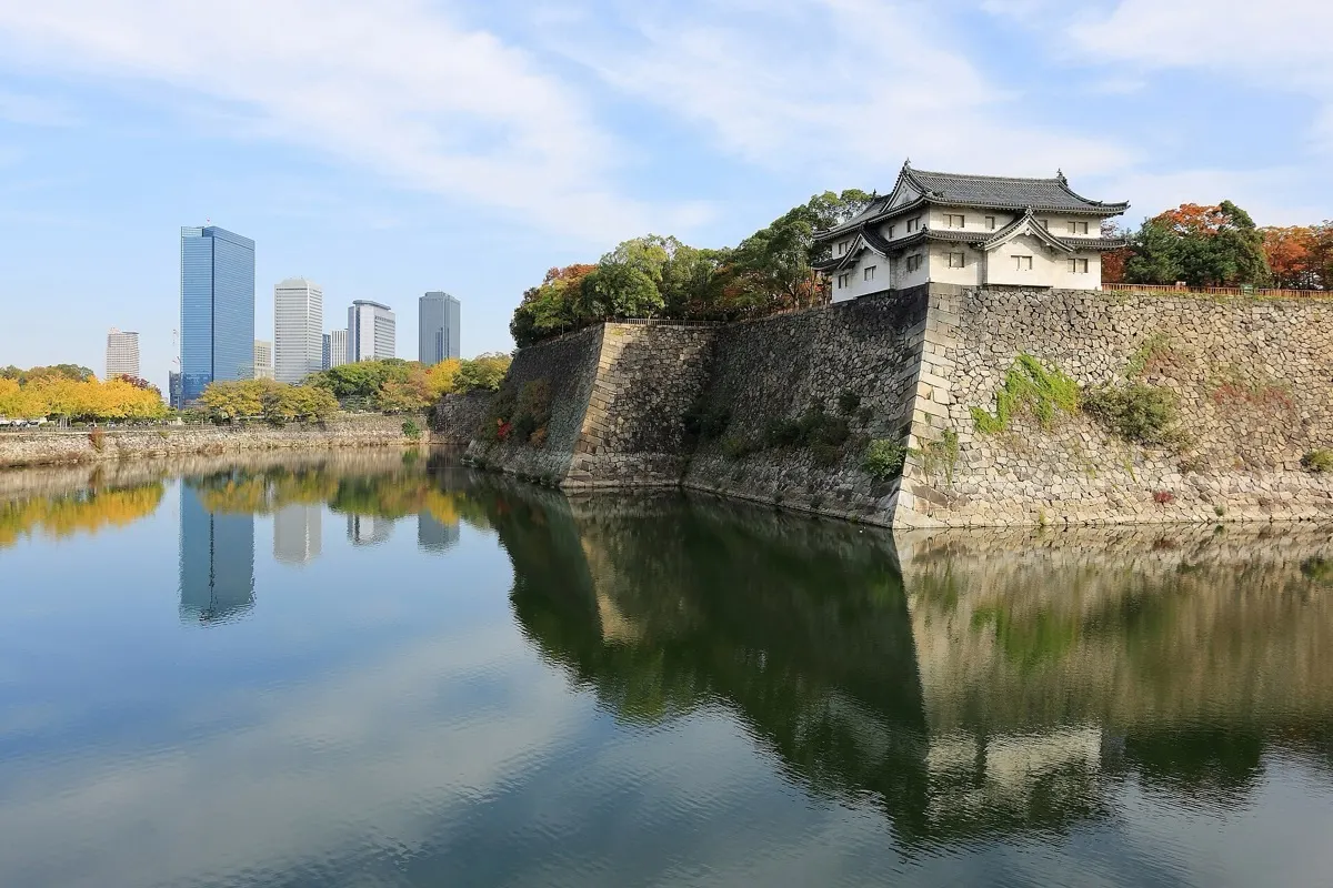 Osaka Castle outer moat with the Osaka Business Park skyline behind