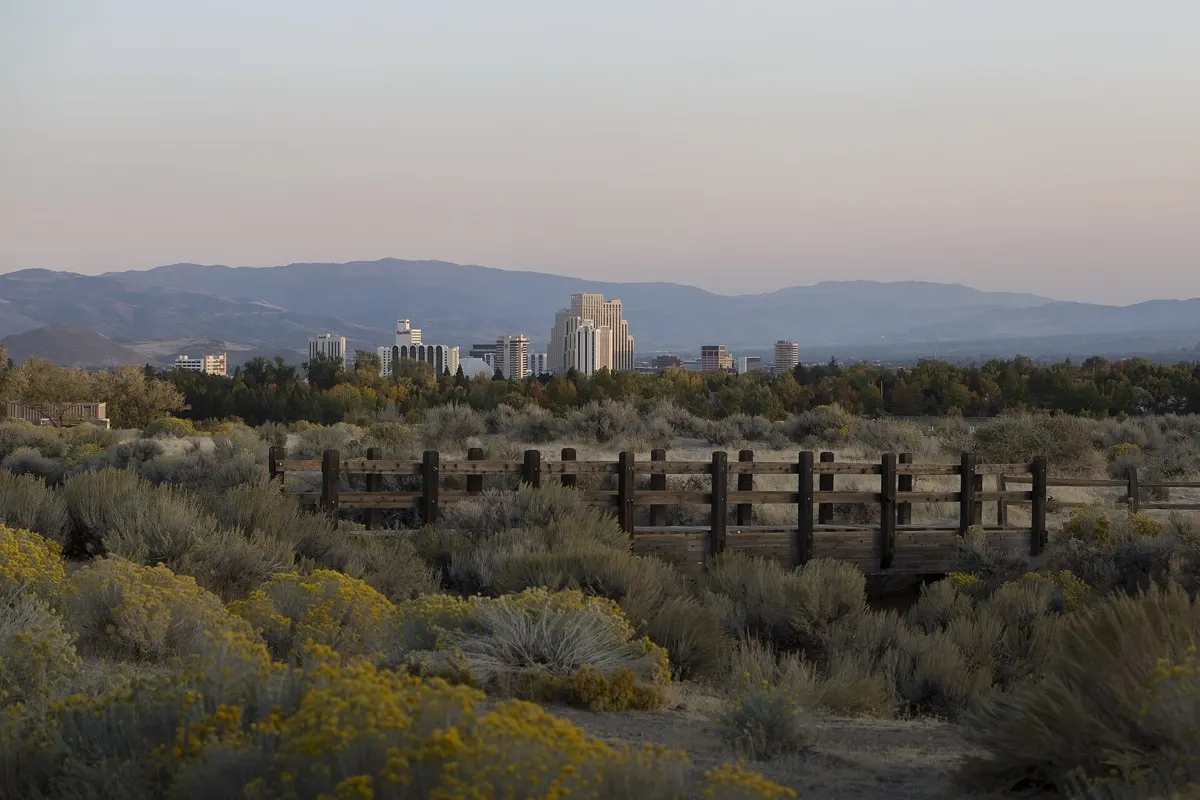Reno, Nevada skyline with mountains in the background and high-desert sagebrush in the foreground